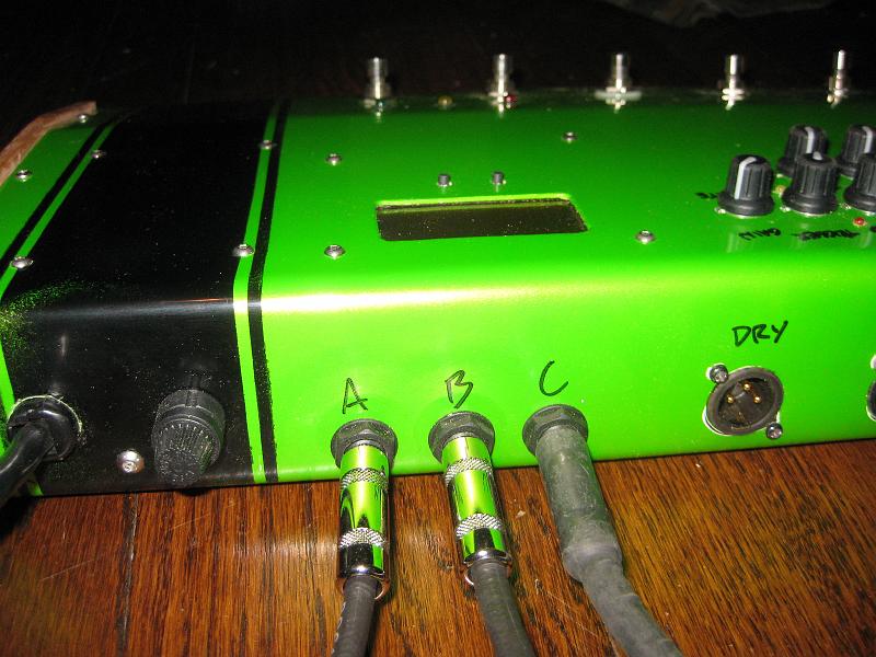 ABCIn.JPG - Power and inputs. The power section uses dual transformers, so the pedal and output power are separate. The three inputs are wired so that when one is not in use, it sends the guitar signal through a resistor to ground to reduce noise.